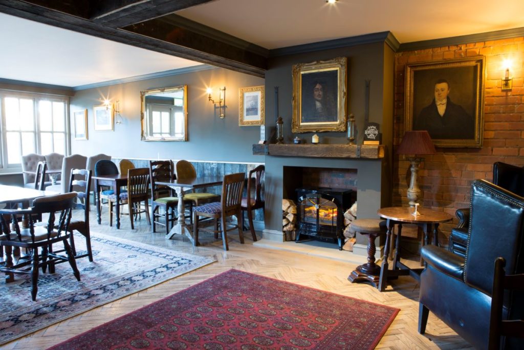 New fireplace and seating at Alderley Edge pub, The Drum and Monkey