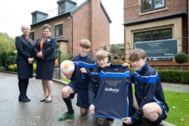 Bellway sales advisors Lin and Chantelle (left) with Wilmslow Town players Callum Prentice, Henry Evans Jones, and James Smith